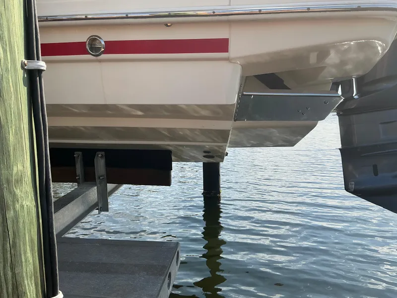 Slide: The Image of 2019 Scout 255 Dorado boat engine and propeller in water. - 38