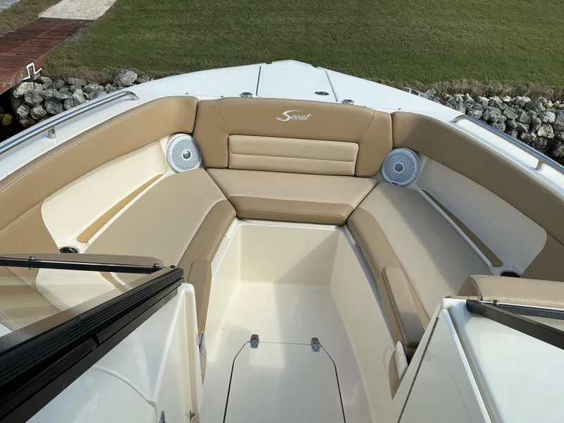 Slide: The Image of 2019 Scout 255 Dorado boat on lift, displaying registration FL7463RT. - 4