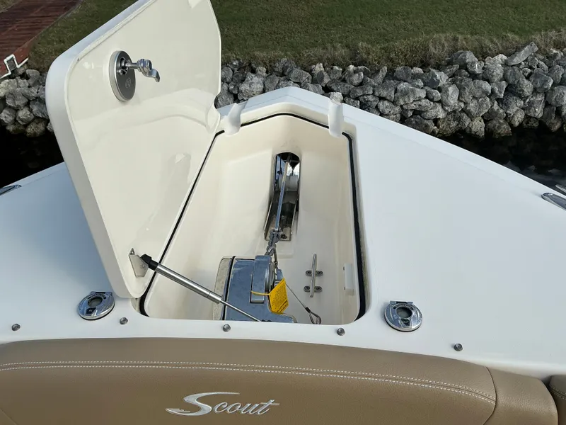 Slide: The Image of 2019 Scout 255 Dorado boat interior with dual consoles and waterfront view. - 6