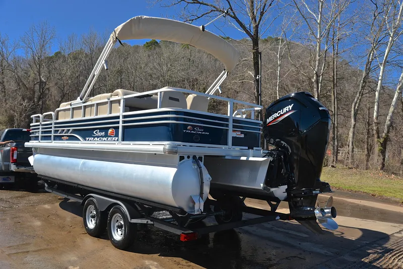 Slide: The Image of 2023 Sun Tracker Fishin Barge 20 DLX pontoon boat with Mercury engine on trailer. - 12