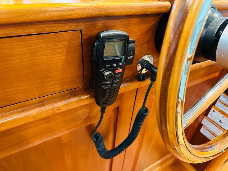 Slide: The Image of 2017 Sabre Salon Express interior with mounted radio and wooden steering wheel. - 20