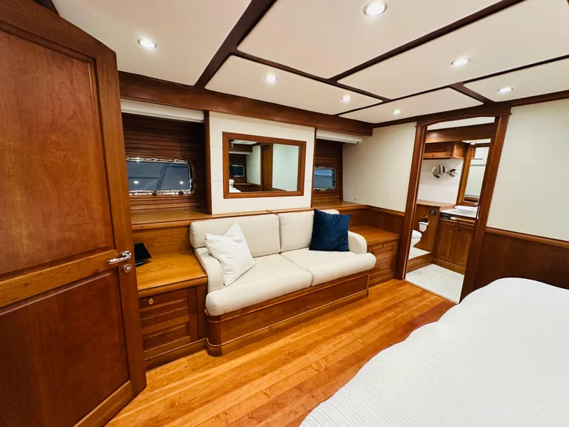 Slide: The Image of Luxurious 2017 Sabre Salon Express interior with elegant wood finish and cozy seating area. - 44