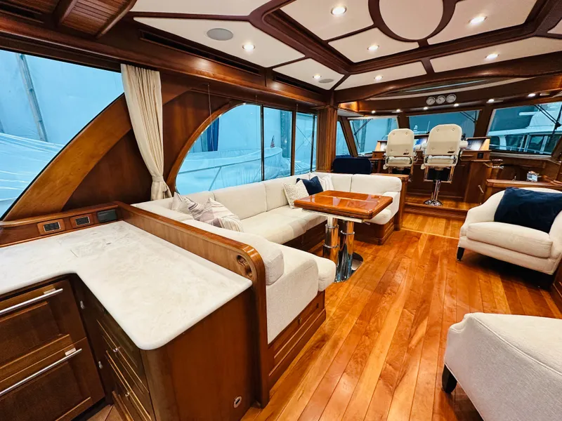 Slide: The Image of Luxurious interior of 2017 Sabre Salon Express yacht with elegant wood finishes and plush seating. - 6