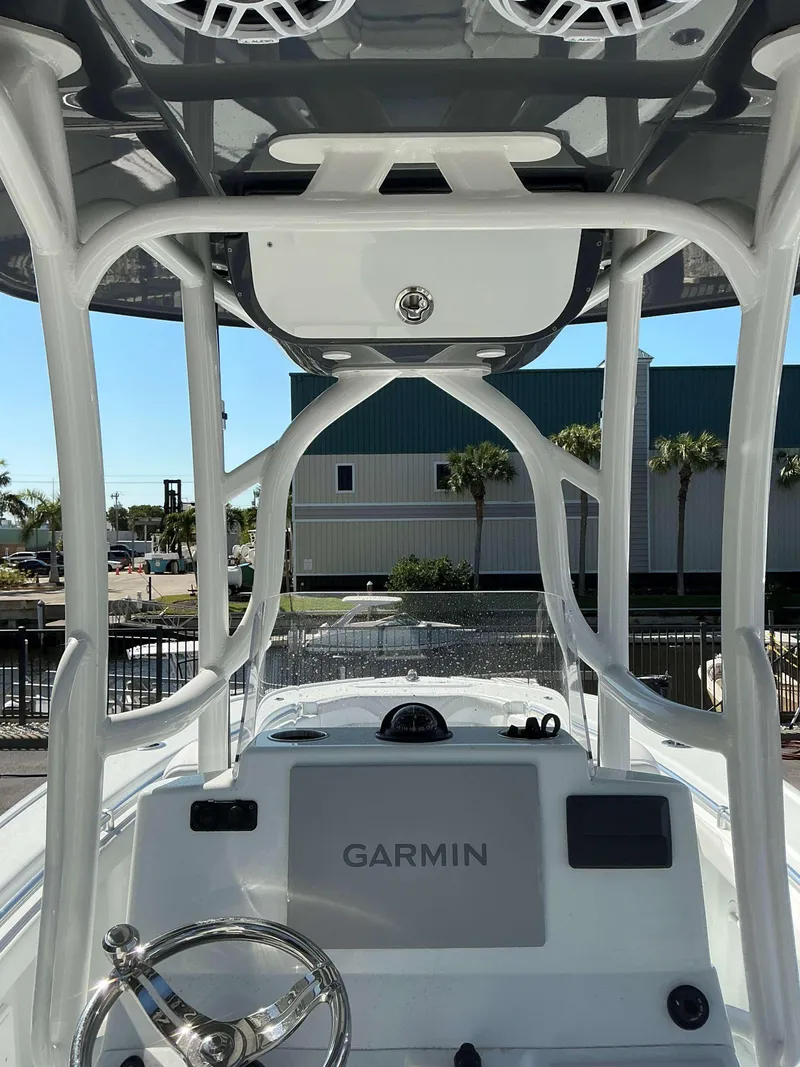 Slide: The Image of 2023 Yellowfin 26 CC Hybrid boat console with Garmin navigation system. - 6