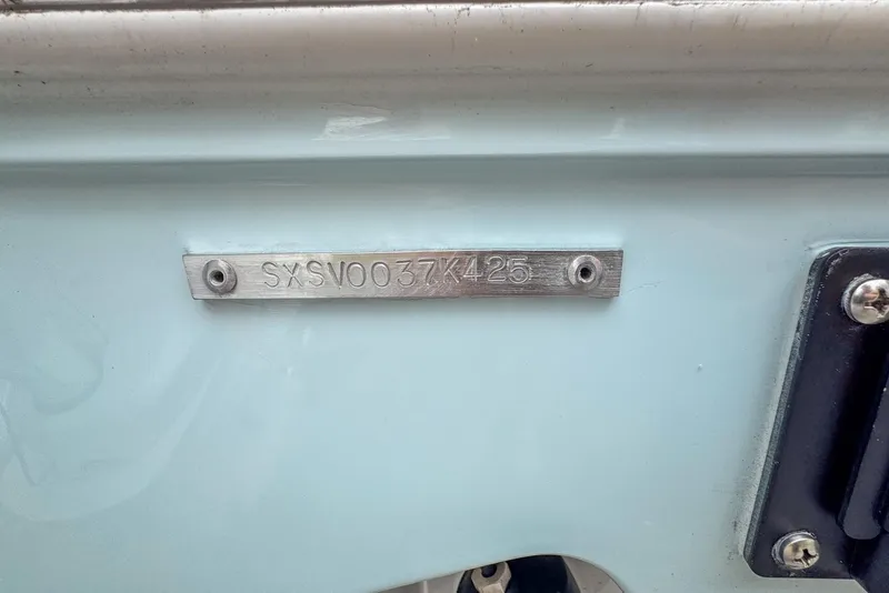 Slide: The Image of 2025 Sea Hunt Gamefish 28 FS boat hull identification number plate. - 8