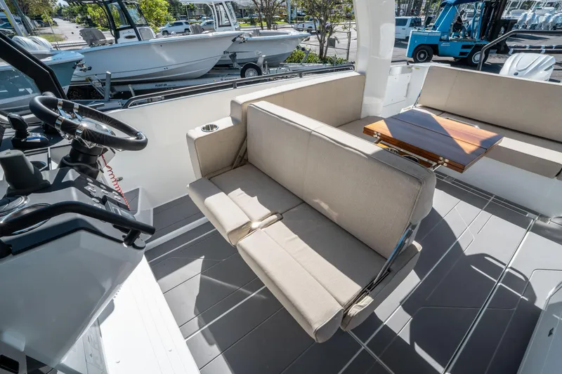 Slide: The Image of 2025 Quarken 35 Sport Tourer interior with seating and steering wheel. - 27