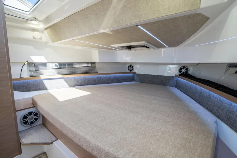 Slide: The Image of Interior cabin of 2025 Quarken 35 Sport Tourer, featuring a spacious bed and modern design. - 37