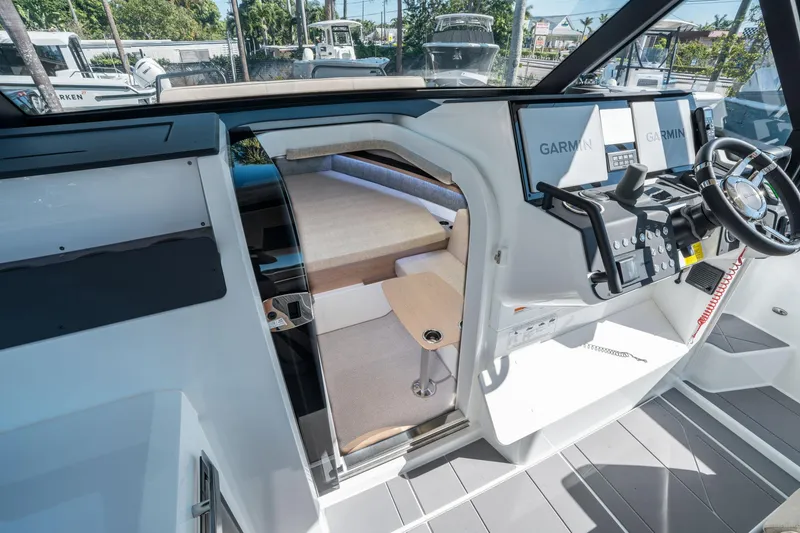 Slide: The Image of Interior view of 2025 Quarken 35 Sport Tourer, featuring modern cockpit and cabin area. - 34