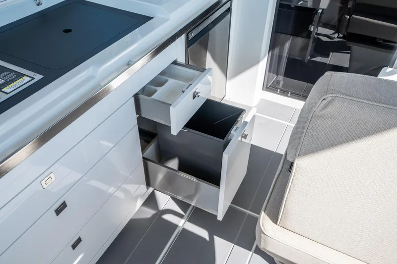 Slide: The Image of Interior of 2025 Quarken 35 Sport Tourer showing open drawers and modern design. - 22