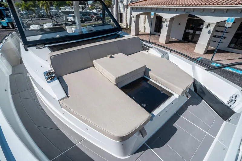 Slide: The Image of 2025 Quarken 35 Sport Tourer boat with spacious sunbathing area and modern design. - 31