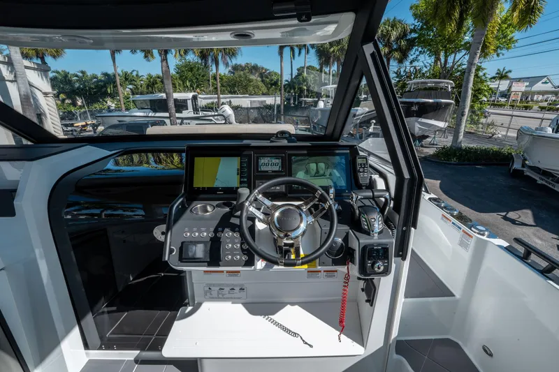 Slide: The Image of Cockpit of 2025 Quarken 35 Sport Tourer with advanced navigation and control systems. - 24