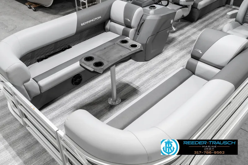 Slide: The Image of 2025 Bennington 21 SSR pontoon boat interior with gray seating and table. - 12