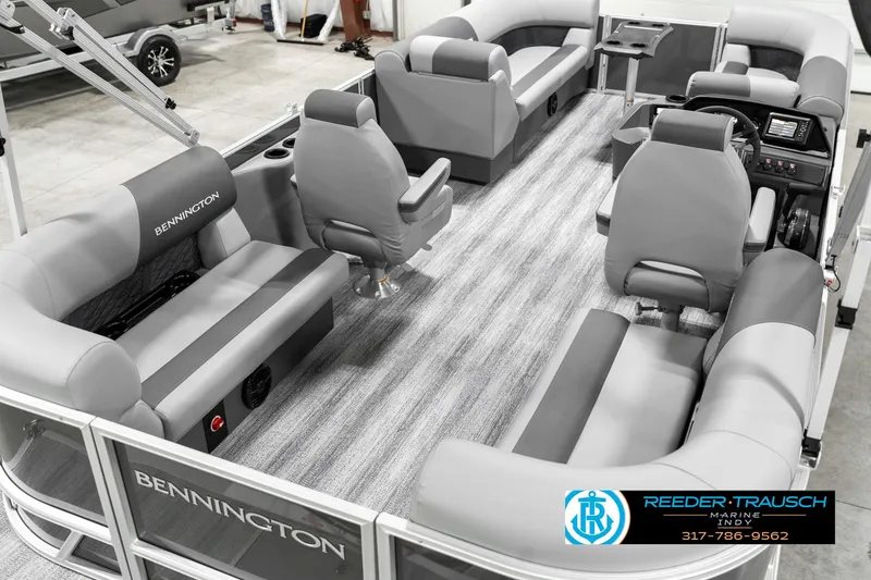 Slide: The Image of 2025 Bennington 21 SSR pontoon boat interior with gray seating and modern design. - 14