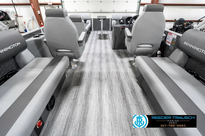Slide: The Image of 2025 Bennington 21 SSR boat interior with gray seating and modern design. - 19