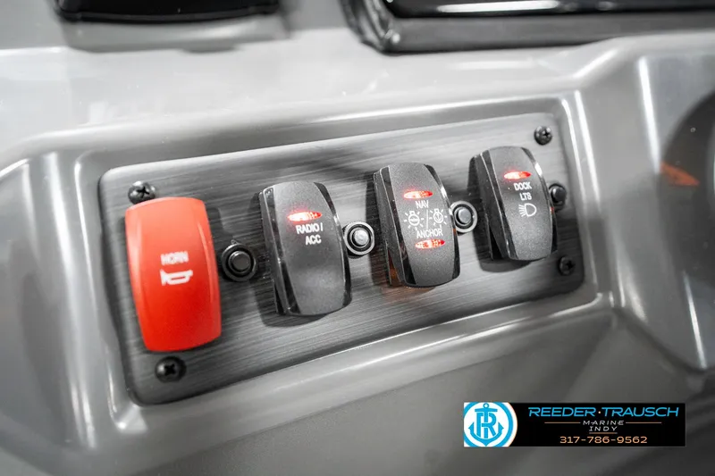 Slide: The Image of Control panel of 2025 Bennington 21 SSR boat with labeled switches. - 31
