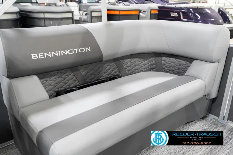 Slide: The Image of 2025 Bennington 21 SSR boat interior with gray cushioned seating. - 39
