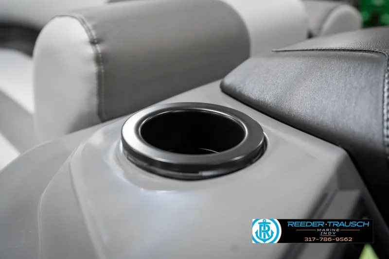Slide: The Image of Cup holder on 2025 Bennington 21 SSR boat seat, featuring Reeder-Trausch Marine logo. - 42