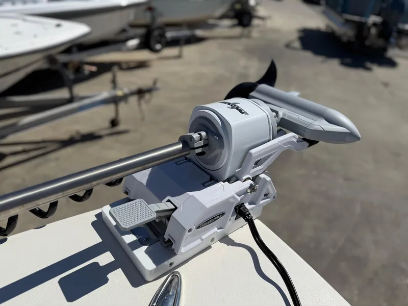 Slide: The Image of Trolling motor on a 2018 Pathfinder 2600 TRS boat, docked outdoors. - 10