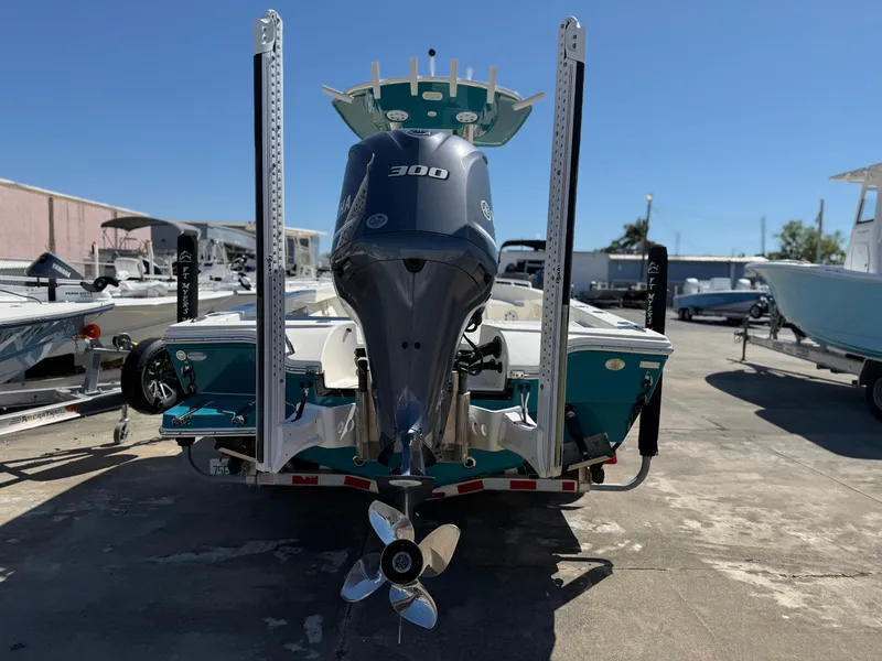 Slide: The Image of 2018 Pathfinder 2600 TRS boat with 300 horsepower engine, parked on a trailer. - 4