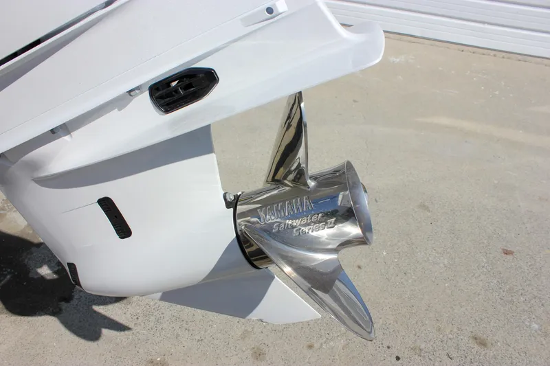 Slide: The Image of Propeller of 2025 Sea Hunt Ultra 255 SE boat on concrete surface. - 10