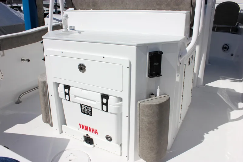 Slide: The Image of 2025 Sea Hunt Ultra 255 SE boat interior with Yamaha cooler and storage. - 3