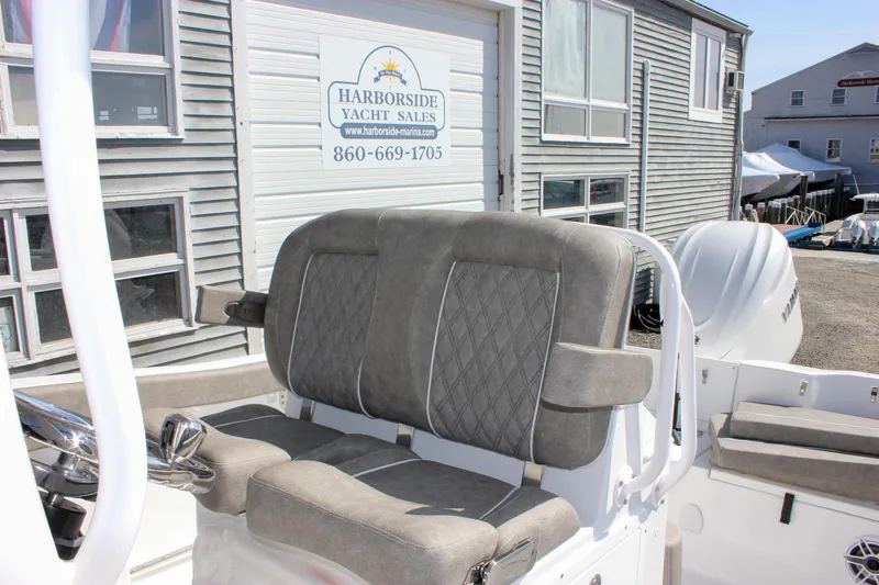 Slide: The Image of 2025 Sea Hunt Ultra 255 SE boat seating at Harborside Yacht Sales. - 31