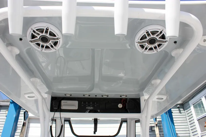 Slide: The Image of 2025 Sea Hunt Ultra 255 SE boat speakers and console detail. - 5