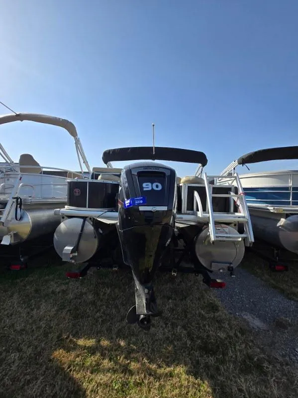 Slide: The Image of 2018 Misty Harbor 2085 Adventure CF pontoon boat with 90 HP engine, parked on grass. - 12