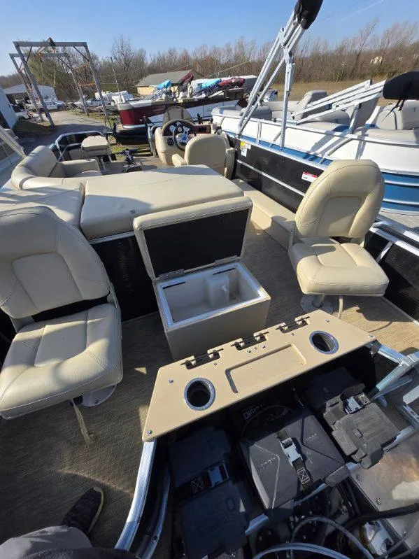 Slide: The Image of 2018 Misty Harbor 2085 Adventure CF boat interior with beige seating and control panel. - 15