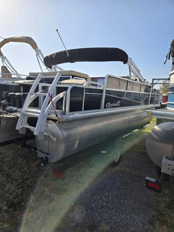 Slide: The Image of 2018 Misty Harbor 2085 Adventure CF pontoon boat, parked on grass, side view. - 4
