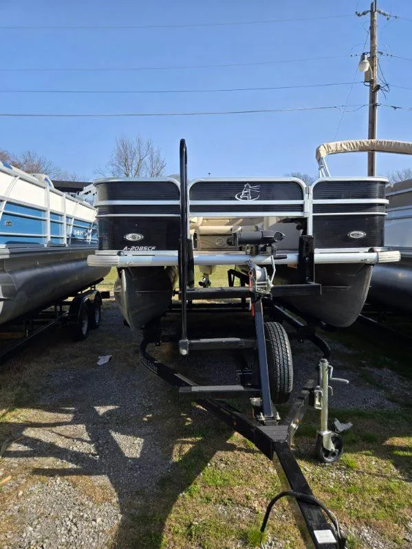 Slide: The Image of 2018 Misty Harbor 2085 Adventure CF pontoon boat on trailer, parked outdoors. - 6
