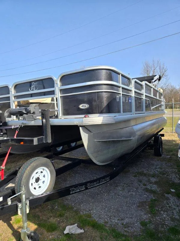 Slide: The Image of 2018 Misty Harbor 2085 Adventure CF pontoon boat on trailer, parked outdoors. - 7