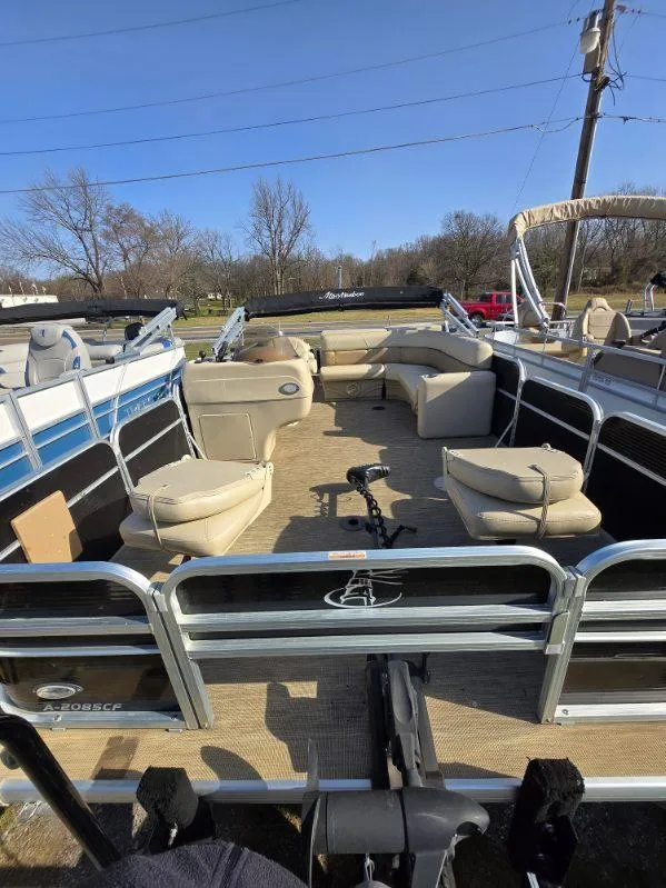 Slide: The Image of 2018 Misty Harbor 2085 Adventure CF pontoon boat with spacious seating, parked outdoors. - 8