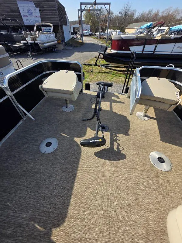 Slide: The Image of 2018 Misty Harbor 2085 Adventure CF pontoon boat deck with fishing seats and motor. - 9