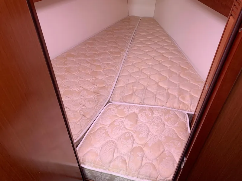Slide: The Image of Beneteau Oceanis 31 cabin interior with beige mattresses, 2010 model. - 20
