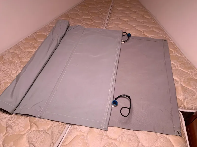 Slide: The Image of Gray sail cover on mattress, Beneteau Oceanis 31, 2010 model. - 21