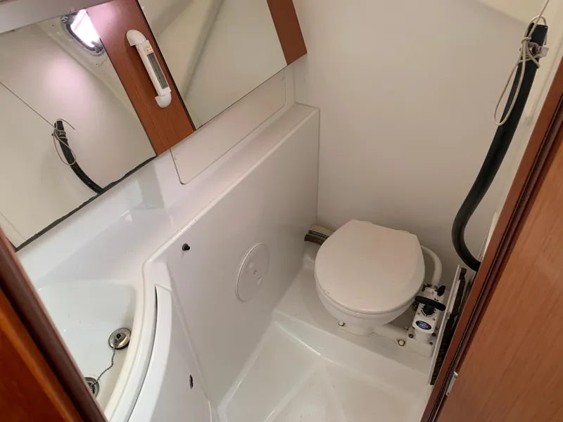 Slide: The Image of Beneteau Oceanis 31 2010 yacht bathroom with toilet and sink. - 28