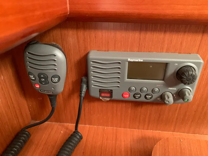 Slide: The Image of VHF radio system on 2010 Beneteau Oceanis 31 yacht, featuring Raymarine equipment. - 34