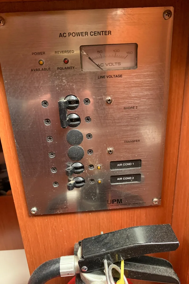 Slide: The Image of AC power center panel on a 2010 Beneteau Oceanis 31 yacht. - 36