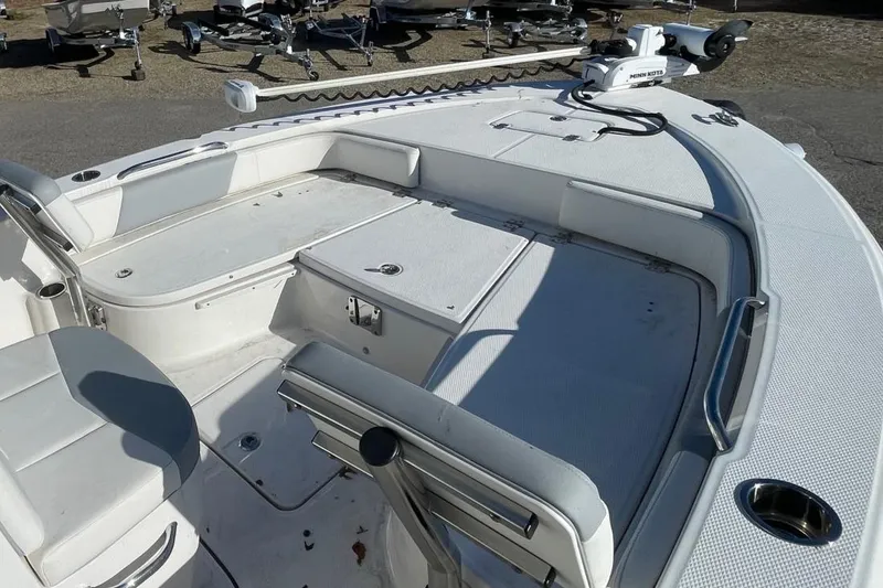 Slide: The Image of 2022 Robalo 226 Cayman boat interior, featuring spacious seating and modern design. - 10