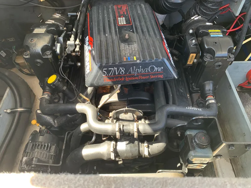 Slide: The Image of Engine of a 2009 Bayliner 205 boat, featuring a 5.7 V8 Alpha One motor. - 9