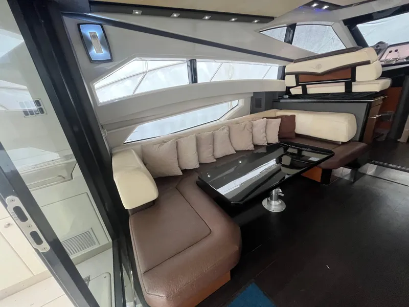 Slide: The Image of Luxurious interior of 2010 Marquis 500 Sport Bridge yacht with plush seating and modern design. - 26