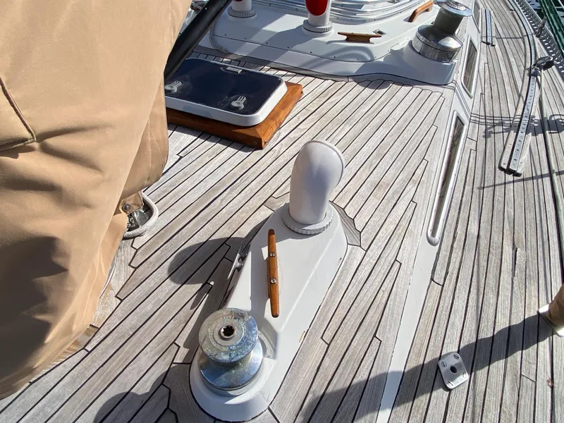 Slide: The Image of Deck of 1973 Nautor Swan 44 sailboat with winches and wooden details. - 12