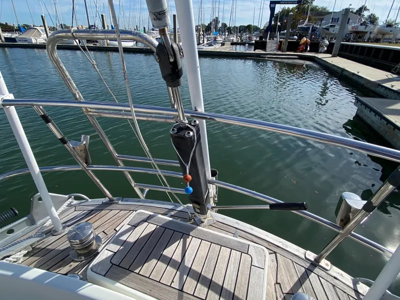 Slide: The Image of Nautor Swan 44 sailboat deck, 1973 model, docked at a marina. - 17