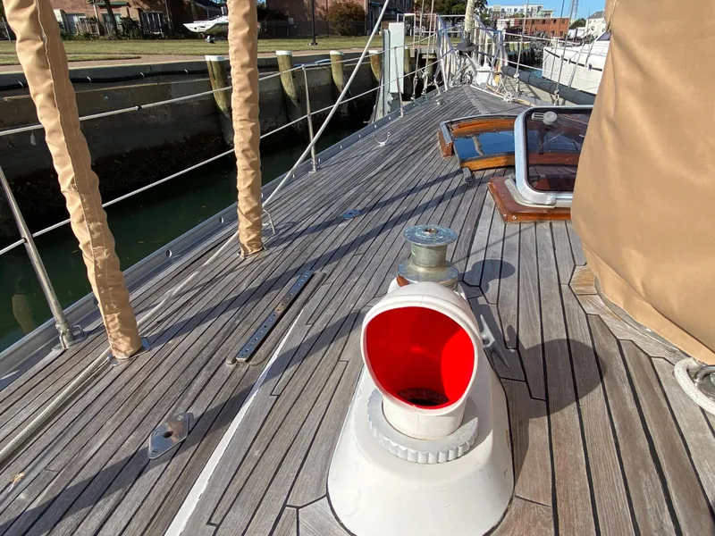 Slide: The Image of Deck of 1973 Nautor Swan 44 sailboat with winch and red vent. - 25