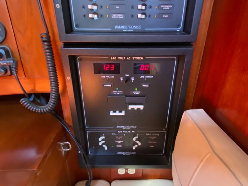 Slide: The Image of Control panel of a 1973 Nautor Swan 44 yacht, displaying 240-volt AC system. - 43
