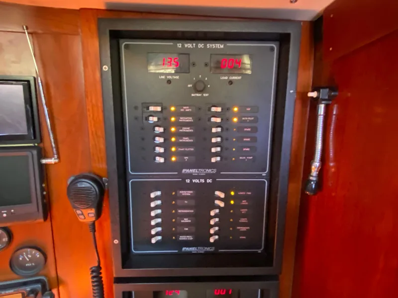 Slide: The Image of Electrical panel on a 1973 Nautor Swan 44 yacht, featuring 12-volt DC system controls. - 44