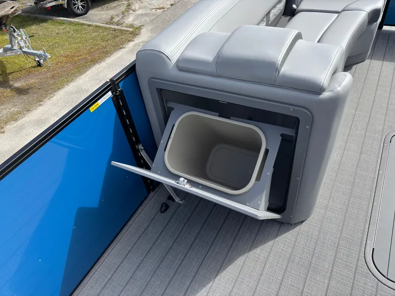 Slide: The Image of 2025 SunCatcher Fusion 324RC boat with built-in storage compartment and seating. - 17