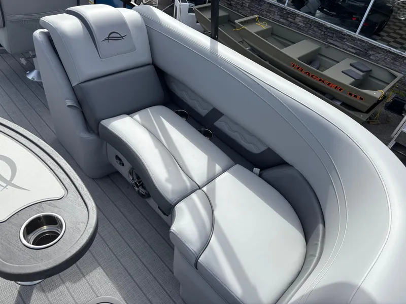 Slide: The Image of Luxurious seating on 2025 SunCatcher Fusion 324RC boat, featuring sleek gray upholstery. - 22