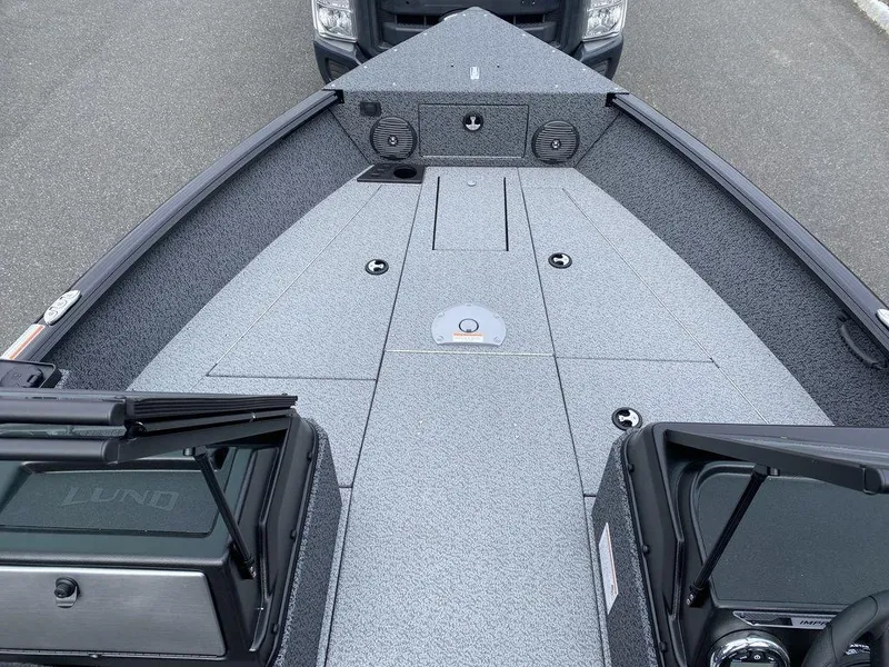 Slide: The Image of 2025 Lund 1875 Impact XS Sport boat deck, featuring spacious layout and modern design. - 9